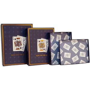 Elevate your gift packaging or storage solutions with our charming King For The Day 3 Nested Shirt Boxes. Perfect for adding a touch of regal elegance, this set features three beautifully designed boxes that fit neatly inside one another.

Each box boasts a sophisticated dark blue finish, adorned with a subtle card suit pattern and a striking King of Hearts motif, complete with a golden border for a luxurious feel. The interior of the smaller boxes reveals a playful scattering of King of Hearts cards, adding an extra layer of delight.

Ideal for presenting shirts, ties, or other special gifts, these versatile boxes also make stylish storage solutions for any home. Offer your customers a truly memorable unboxing experience or a chic way to organise their treasures. Sold as a single pack containing all three nested boxes.