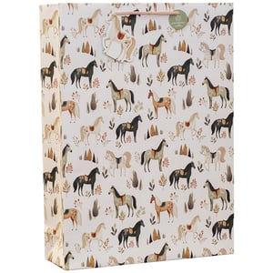 Gallop into gifting with our delightful Extra Large Pony Trek Gift Bag! Perfect for any horse enthusiast or nature lover, this charming bag features a beautiful pattern of ponies in various colours, nestled amongst subtle autumnal foliage. The extra-large size makes it ideal for those bigger gifts, ensuring your customers can present their presents with style.

Crafted for durability, it includes sturdy rope handles for comfortable carrying. Plus, with its eco-friendly and 100% recyclable design, it's a thoughtful choice for conscious consumers. Supplied by Partisan Products Ltd. in a convenient pack of 6, these bags are a must-have addition to your retail collection.