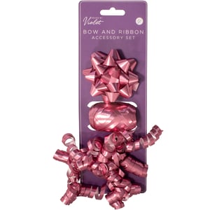 Elevate your gift wrapping game with our delightful Pink Bow and Ribbon Accessory Set! This charming trio, designed by Violet, provides everything your customers need to create beautifully wrapped presents. Each set features a gorgeous metallic pink star bow, a generous spool of matching flat ribbon, and a vibrant bundle of curly crimp ribbon, perfect for adding that extra flourish.
Ideal for birthdays, celebrations, or simply making any gift feel extra special, this versatile set is a must-have for any retail display. The eye-catching pink hue is sure to attract attention. Available in a convenient wholesale pack of 12 individual sets, ensuring you're always stocked up for your customers' gifting needs.