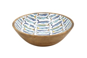 Introduce a splash of seaside charm to your customers' homes with our delightful 25cm Sardines Enamelled Wooden Bowl. Crafted from beautiful natural wood, this versatile bowl features a vibrant enamelled interior adorned with a playful school of blue and yellow sardines.

Perfect for serving salads, snacks, or simply as a decorative centrepiece, its unique design and quality finish make it a standout piece. The 25cm size offers ample space for various uses, bringing a touch of coastal elegance to any dining table or kitchen. A charming and practical addition that's sure to catch the eye!