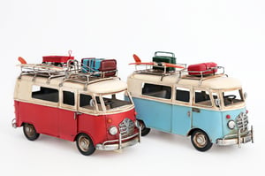 Bring a touch of retro charm to any home with our delightful 27x17cm Campervan Ornaments. This pack of two features iconic vintage-style campervans, one in classic red and cream, and the other in a cool blue and cream. Each intricately detailed ornament comes complete with a roof rack laden with miniature luggage, including surfboards, ready for an adventure! Perfect for adding a nostalgic, wanderlust-inspired accent to shelves, desks, or display cabinets. These charming pieces are ideal for customers who love travel, vintage aesthetics, or unique decorative items.