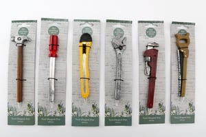 Add a touch of quirky charm to your stationery collection with our delightful Potting Shed Tool Pens! This fantastic set features six uniquely designed pens, each cleverly shaped like a different everyday tool. From a sturdy hammer to a handy screwdriver, a versatile utility knife, an adjustable wrench, a robust pipe wrench, and a classic hand saw, there's a fun design for every DIY enthusiast or garden lover.

Perfect for impulse buys, novelty gifts, or simply brightening up a desk, these pens are sure to spark conversation. Each pen comes individually packaged on an attractive 'the potting shed' card, making them ready for display. Supplied by Sifcon International PLC, this wholesale pack includes 6 assorted designs (1x6). A brilliant addition to any gift shop, garden centre, or stationery store!