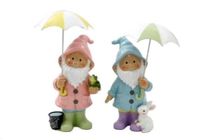 Introduce a touch of whimsical charm to your retail collection with our delightful 33.5cm Gnome Holding Umbrella figures. These adorable garden gnomes come in two enchanting designs, perfect for brightening up any space.
One gnome sports a cheerful pink outfit, complete with a little frog friend and a yellow and white umbrella. The other is dressed in calming blue, accompanied by a sweet white rabbit and a green and white umbrella. Both gnomes feature classic white beards, rosy cheeks, and colourful raincoats with matching boots, ready for any weather.
Available in a convenient pack of 1x2, these high-quality decorations ensure you have both charming designs for your customers. They're an irresistible addition to any home or garden decor range, sure to bring smiles all year round.