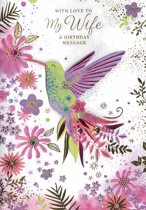 Presenting the 'Wife' birthday card, a truly beautiful design from Simon Elvin, perfect for celebrating that special someone. This exquisite card features a vibrant hummingbird, gracefully depicted amidst a stunning array of pink and purple flowers. Delicate gold accents and sparkling embellishments add a touch of luxury, making it a truly memorable choice for a wife's birthday. The heartfelt message 'WITH LOVE TO My Wife' sets the perfect tone for a cherished greeting. This card offers a wonderful way to express love and appreciation. Available in a convenient pack size of 1x6, it's an ideal addition to your greeting card selection, offering customers a premium option for a beloved wife.