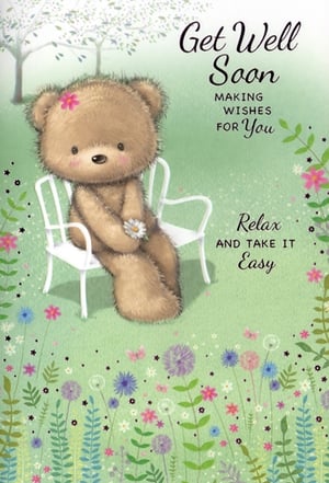 Offer a comforting touch with our 'Get Well Female' card, supplied by Simon Elvin. This delightful design features an endearing brown teddy bear, adorned with a sweet pink flower, relaxing on a garden chair while holding a delicate daisy. The serene green backdrop is beautifully illustrated with a scattering of wildflowers and butterflies, creating a truly peaceful scene. Inside, the card conveys heartfelt messages like "Get Well Soon," "Making Wishes For You," and "Relax And Take It Easy," offering warmth and encouragement. Available in a convenient 1x6 pack, these cards are a perfect addition for retailers seeking a charming and thoughtful option to help customers send their best wishes.