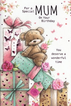 Make Mum's birthday extra special with this delightful card! Featuring an irresistibly cute teddy bear holding a pink rose, perched atop a charming stack of beautifully wrapped gifts. The design is adorned with pretty pink bows, delicate butterflies, and sweet heart patterns, creating a truly heartwarming scene. The loving message, "For a Special MUM On Your Birthday, You deserve a wonderful time," perfectly conveys affection. This popular Simon Elvin design is a must-have for your card selection. Available in a convenient pack of 6, it's ready to charm your customers and celebrate every wonderful mum.