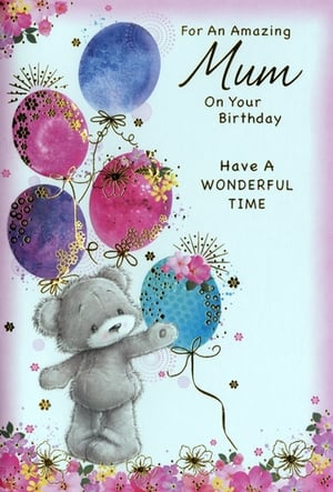 Celebrate Mum's special day with this absolutely charming birthday card from Simon Elvin. Featuring an adorable grey teddy bear reaching out to a cluster of beautifully decorated balloons in shades of pink, purple, and blue, this card is sure to bring a smile. Delicate floral accents frame the design, adding a touch of elegance and warmth. The heartfelt message, "For An Amazing Mum On Your Birthday, Have A Wonderful Time," makes it the perfect choice for showing appreciation. Stock up on this lovely design, available in a convenient pack of 6, and offer your customers a truly delightful way to honour their amazing mums.