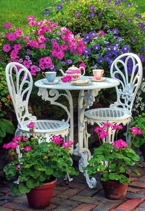 Step into a world of tranquil beauty with this delightful 'Blank Female' card design. It perfectly captures the charm of a sun-drenched garden, featuring an inviting white bistro table set for tea amidst a vibrant display of fuchsia and violet blooms. Potted pink geraniums add a lovely splash of colour to this idyllic scene.
This versatile card is ideal for a wide array of occasions, offering a beautiful blank canvas for your customers' personal messages to any special woman in their lives. Its elegant and peaceful ambiance makes it a truly heartwarming choice.
Supplied by Simon Elvin, this exquisite design comes in a convenient pack of 6, ready to grace your shelves.