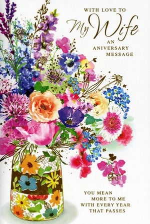 Celebrate your enduring love with this beautiful 'My Wife' Wedding Anniversary card from Simon Elvin. Featuring a stunning watercolour illustration of a vibrant floral bouquet nestled in a charming patterned vase, this card is designed to truly capture her heart.

The elegant front reads, "WITH LOVE TO My Wife AN ANNIVERSARY MESSAGE," complemented by the heartfelt sentiment, "YOU MEAN MORE TO ME WITH EVERY YEAR THAT PASSES." It's the perfect way to express your deep appreciation and affection. Crafted with care, this thoughtful card offers a memorable way to mark another wonderful year together. Make your anniversary extra special with this artistic and loving gesture.