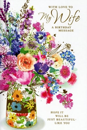 Help your customers celebrate their wonderful wives with this beautiful birthday card from Simon Elvin. Adorned with a vibrant, watercolour-style floral bouquet, this card is a true visual delight, bursting with rich colours and intricate details. The loving message, 'With Love to My Wife, A Birthday Message' and 'Hope it will be just beautiful - like you', offers a truly heartfelt sentiment. Perfect for any retailer, these 'Wife' cards come in a convenient pack of 6, ensuring you're well-stocked for those special occasions. A truly charming choice for a cherished wife.