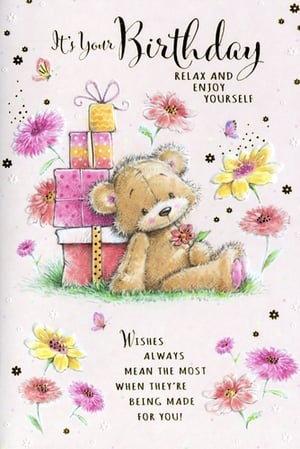 Make her birthday extra special with this delightful Open Birthday Female card from Simon Elvin. This charming design features an adorable teddy bear, surrounded by a stack of colourful gifts and beautiful blooming flowers. Delicate butterflies add a touch of whimsy to the soft, sparkling background. The elegant script wishes "It's Your Birthday, RELAX AND ENJOY YOURSELF," setting a lovely tone for her celebration. Inside, the thoughtful message reads: "Wishes ALWAYS MEAN THE MOST WHEN THEY'RE BEING MADE FOR YOU!" A truly heartwarming choice for any female recipient, these cards are supplied in a convenient pack of 6.