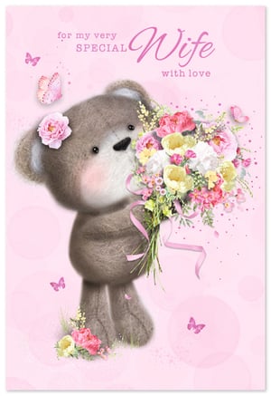Show your wonderful wife just how much she means to you with this utterly charming greeting card. Featuring an adorable teddy bear lovingly presenting a vibrant bouquet of beautiful flowers, this card is designed to delight. Set against a soft pink background adorned with delicate butterflies, the sweet illustration perfectly complements the heartfelt message: 'for my very SPECIAL Wife with love'.
Crafted with care by Simon Elvin, this lovely card offers a truly special way to express your affection. It's ideal for anniversaries, birthdays, or simply to say 'I love you'. A delightful choice that's sure to bring a warm smile to her face.