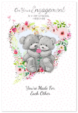 Celebrate the joyous news with this utterly charming Engagement card from Simon Elvin. Featuring two adorable grey teddy bears embracing, one holding a delicate pink rose, this design is truly heartwarming. The sweet scene is beautifully framed by a watercolour-style floral heart, adding a touch of romance and elegance.

With the lovely messages "On Your Engagement" and "You're Made For Each Other," this card perfectly captures the joy and sentiment of a special couple's big news. It's the ideal choice for customers looking to send their warmest congratulations. Stock up on this delightful design, available in a convenient pack of 6, and offer the perfect way to celebrate love.