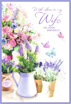 "Wife" Birthday Card by Simon Elvin.

Celebrate her special day with this truly beautiful birthday card, designed especially for a beloved wife. From Simon Elvin, this exquisite card features a delightful watercolour illustration of a vibrant floral bouquet, complemented by charming lavender plants in pots and a jug. Delicate butterflies flutter across the design, adding a touch of whimsy. The loving message, 'With Love to my Wife ON YOUR BIRTHDAY,' is elegantly presented, making it a perfect choice to convey heartfelt affection. This thoughtful card is sure to make her feel cherished. Supplied in a handy pack of 6, it's an essential addition to your greeting card range.