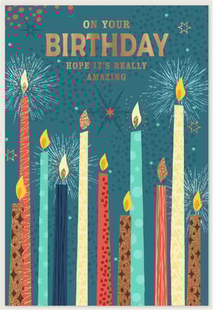 Make every birthday special with our stunning Open Birthday Male card from Simon Elvin. This eye-catching design features a rich teal background, brought to life with an assortment of stylish, patterned candles in various colours and textures, including shimmering glitter accents. The prominent "BIRTHDAY" message shines in luxurious gold foil, complemented by the heartfelt wish, "HOPE IT'S REALLY AMAZING." Festive sparkler effects and scattered stars add a celebratory touch, ensuring this card stands out. Perfect for male recipients of all ages, this card comes in a handy pack of 6, offering a sophisticated and modern option for your customers.
