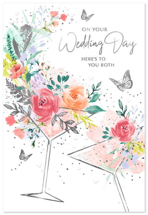 "On Your Wedding Day, Here's To You Both!" This exquisite card from Simon Elvin offers a truly charming way to celebrate the happy couple. Its beautiful watercolour design features a delightful array of soft pink, orange, and green florals, elegantly arranged within two stylish martini glasses. Delicate butterflies and subtle speckles add a touch of magic, complementing the heartfelt message. With its modern yet romantic aesthetic, this card is a perfect choice for customers seeking a special way to convey their best wishes. Available in a convenient 1x6 pack, it's an ideal addition to your greeting card selection.