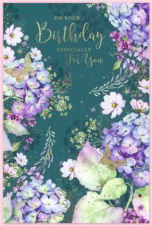 Introduce a touch of floral elegance to your card selection with our "Open Birthday Female" card from Simon Elvin. This beautiful design features a captivating array of hydrangeas and cosmos in soft purples, blues, and pinks, beautifully contrasted against a deep teal backdrop. Glimmering gold foil butterflies and sophisticated script lettering for "On Your Birthday Especially For You" add a luxurious finish. Perfect for celebrating any special woman, this card conveys warmth and beauty. Supplied in a handy pack of 6 (1x6), it's a delightful choice for retailers looking for quality and charm.
