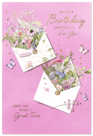 Send heartfelt birthday wishes with this enchanting card, perfect for any special woman in your life. Adorned with a delightful design, it features two elegant envelopes overflowing with a vibrant array of delicate wildflowers and foliage. Set against a soft pink backdrop, pretty butterflies and subtle golden sparkles add a touch of magic. The beautiful gold foil lettering wishes "ON YOUR Birthday ESPECIALLY For You" and "HOPE YOU HAVE A Great Time." This charming card is a wonderful way to celebrate and make her day extra special.