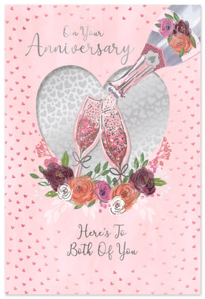 Make every anniversary sparkle with our 'Your Wedding Anniversary' card from Simon Elvin. This delightful design features a charming champagne bottle pouring into two clinking flutes, all set within a heart-shaped window. Adorned with beautiful floral accents and shimmering glitter details, it's the perfect way to celebrate a special couple. The elegant 'On Your Anniversary' and 'Here's To Both Of You' messages convey heartfelt wishes. With its romantic pink and silver palette, this card is sure to stand out on your shelves. Available in a handy pack of 6, it's an essential addition to your greeting card collection.