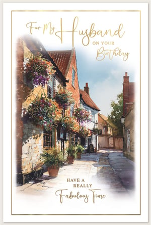 Celebrate your husband's special day with this exquisite birthday card from Simon Elvin. Featuring a captivating watercolour illustration, the design transports you to a charming, sun-drenched street, adorned with vibrant hanging baskets and lush potted plants. The picturesque scene, with its traditional architecture and inviting atmosphere, creates a truly memorable card. Elegant gold script wishes your husband 'A Really Fabulous Time' on his birthday, adding a touch of sophistication. This beautifully crafted card is perfect for conveying your heartfelt sentiments and making his day extra special.