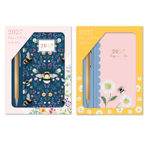 a pink and yellow diary gift set with a pen