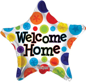 a star shaped balloon that says welcome home