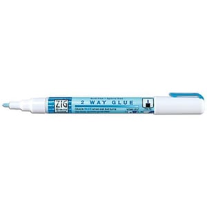 A Zig 2-way glue pen with a blue cap.