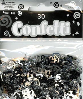 A bag of silver confetti with the number 30 on it.