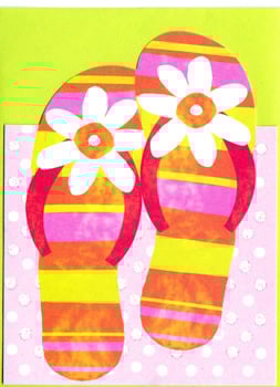 A pair of flip flops with daisies on them.
