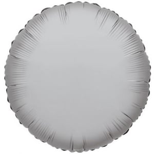 A silver foil balloon is sitting on a white surface.