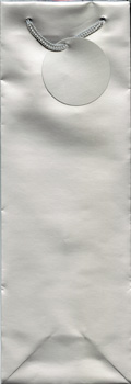 a silver gift bag with a tag on it.
