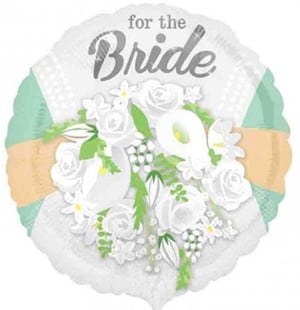 A balloon with a bouquet of white flowers on it is for the bride.
