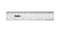 A white plastic ruler with the word "Helix" on it is on a white background.