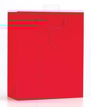 A red gift bag with a tag attached to it.