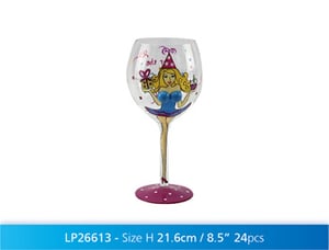 A wine glass with a woman wearing a party hat on it.