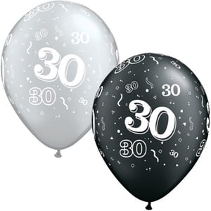 Two balloons with the number 30 on them.
