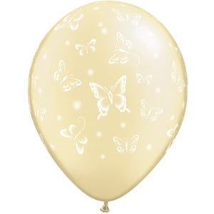 A yellow balloon with white butterflies on it.