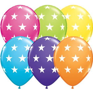 A bunch of colorful balloons with white stars on them.