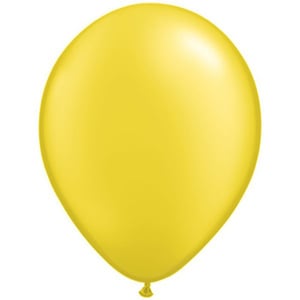A yellow balloon is floating in the air against a white background.