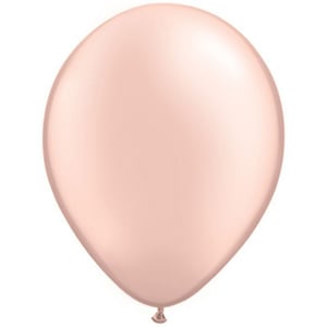 A pink balloon is floating in the air against a white background.
