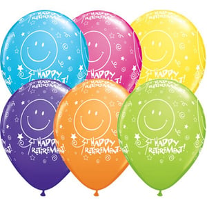 A bunch of balloons that says, "Happy retirement."