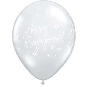 A clear balloon that says "Happy Engagement" on it.