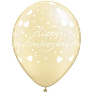 A happy anniversary balloon with hearts on it.