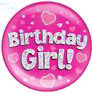 A pink paper plate with the words "birthday girl" on it.