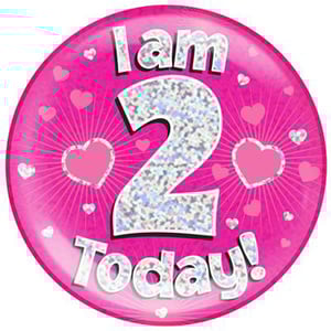 A pink plate with the words "I am 2 today" on it.