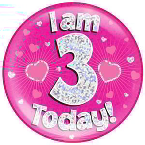 A pink plate with the words "I am 3 today" on it.