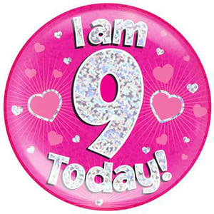 A pink plate with the words "I am 9 today" on it.
