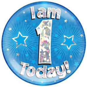 A blue balloon with the words "I am 1 today" on it.
