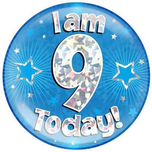 A blue balloon with the words "I am 9 today" on it.