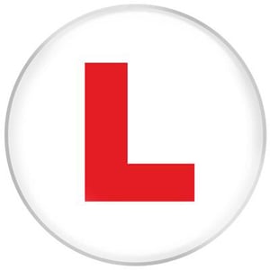 A red letter "l" in a white circle on a white background.